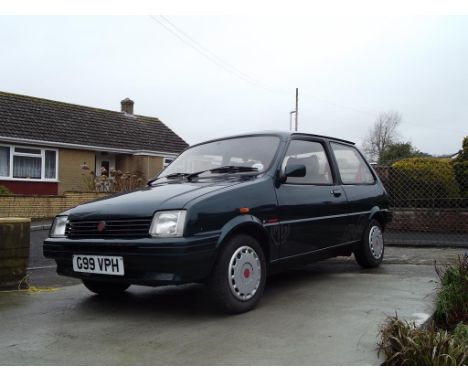 A 1990 MG Metro 1300, registration number G99 VPH, British Racing green. With 23,000 miles from new, the MG was originally su