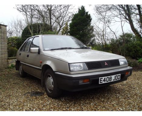 A 1987 Mitsubishi Colt GLX automatic, registration number E408 JDD, Palermo grey. This one owner Mitsubishi Colt was original