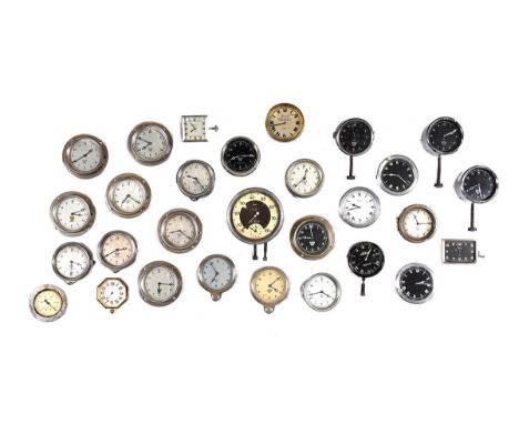 TWENTY NINE MOTORCAR DASHBOARD CLOCK.