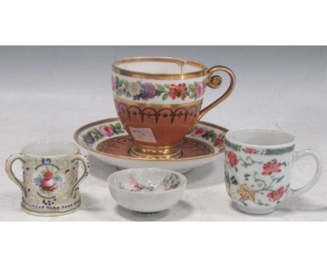 A 19th century Sevres cabinet cup and saucer with bands of floral decoration above a repeating pattern on tobacco ground; a m