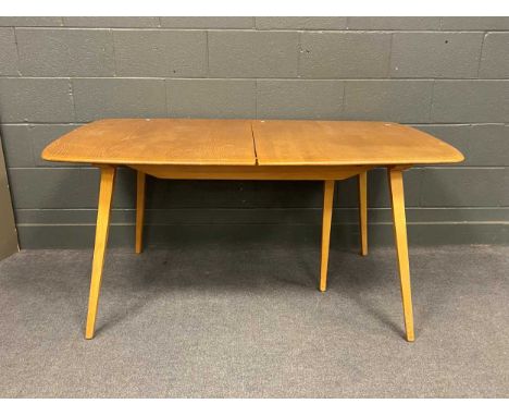 An Ercol type extending dining table with two additional leaves 72cm x 90cm x 225cm (fully extended)no evidence of woodworm, 
