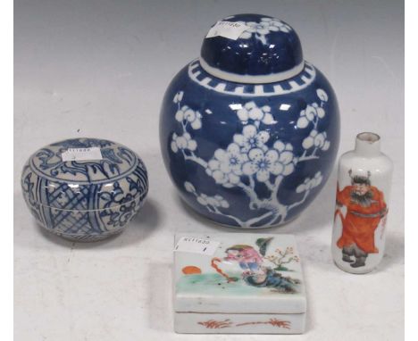 A Chinese porcelain snuff bottle, a square lidded box, lidded circular box, and a small prunus pattern jar (4)in good conditi