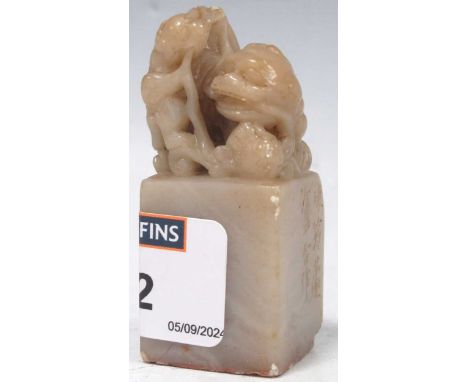 A Chinese soapstone desk seal, late Qing Dynasty, 6cm highchips to corner of the base shownsome chips elsewhere
