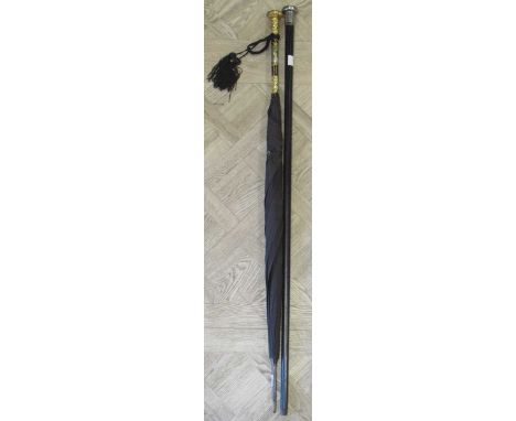 A gilt metal and enamel mounted Art Nouveau parasol; together with a silver mounted walking caneThe handle seems to be metal 