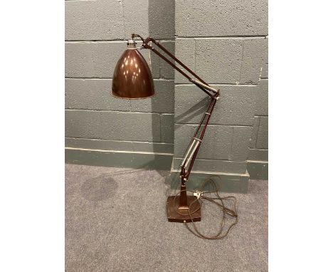 A very large mid century angled industrial lamp with brown enamelled finish set on square section base125cm fully extended.