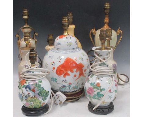 A mixed group of modern ceramic lamps, to include large ovoid lamp painted with carp, pair small lamps with chrysanthemum, th