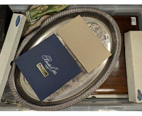 A quantity of silverware including cruets, waiters, napkin rings, inkwell, cigarette box, pepper grinder etc., 1070g (34.5ozt