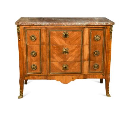 A French transitional style kingwood marble topped commode, 19th century, the breakfront marble top above a single cupboard d