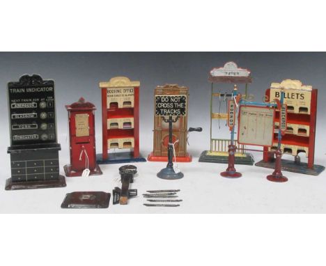 Nine vintage model railway train indicator signs and ticket dispensers (one broken), including a 'Do Not Cross The Tracks' pa