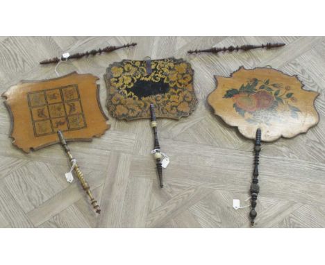 Group of 19th century penwork hand held firescreens or face protectors; the first formed of a cartouche shaped satinwood scre