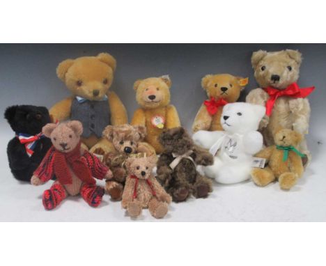 A collection of modern Teddy Bears including a Steiff 1935 'Dicky' replica, a 1909 Steiff replica, both modern, and others by