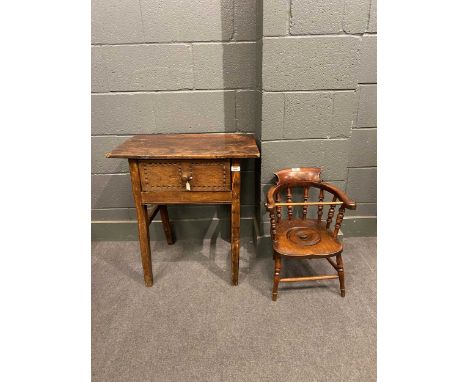 An oak and fruitwood side table with single drawer, champhered tapered legs, with chip carved drawer front 69 x 65 x 41cm tog