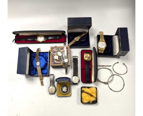 A lady's 9ct gold wristwatch 28.3g ex movement, a 22ct gold wedding ring, 2g and a tie slide stamped 14K, 4.2g together with 