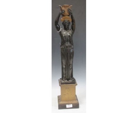 A Regency style bronzed figural lamp, modelled as a classical maiden on a brushed brass plinth65cm high