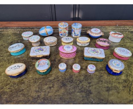 A collection of enamel and porcelain boxes,&nbsp;to include examples by Ashley. (22) 