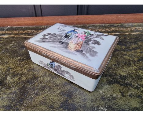 A late 18th century enamel casket,&nbsp;the interior of the lid painted with a lady, 8.5cm wide, (restoration). 