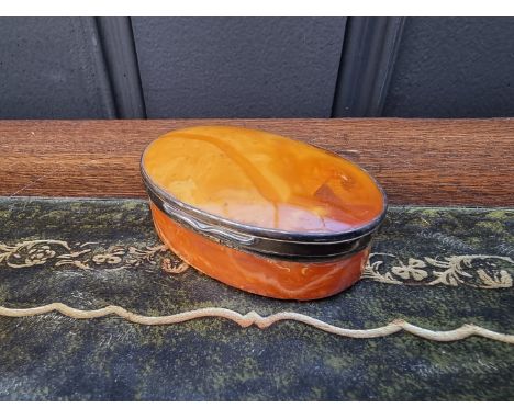 An early Victorian amber and silver gilt mounted oval lidded box, by Ford &amp; Slater, Birmingham 1841, 6.5cm wide. 