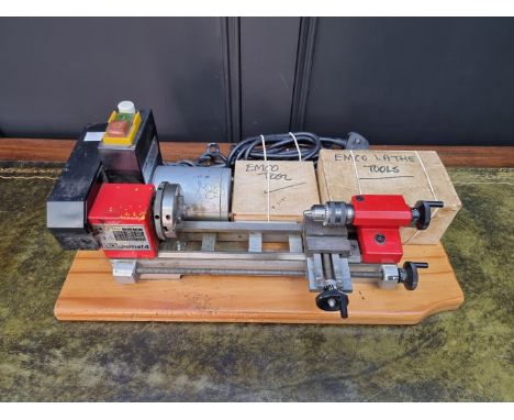 An Emco watchmaker's lathe,&nbsp;with tools. 
