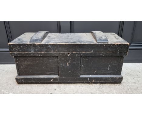 An old wooden tool chest, 79cm wide; together with a quantity of tools. 