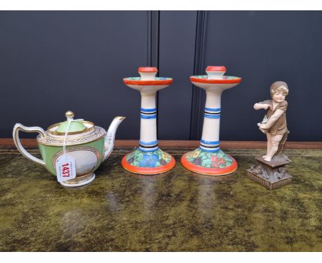 An early 19th century English porcelain apple green ground teapot and cover, painted with panels of 'Cotton Mill, Cromford, D