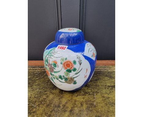 A Chinese famille verte jar and cover,&nbsp;Kangxi four character mark to base, 21.5cm high. 