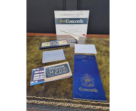 Concorde: a collection of memorabilia and ephemera, to include: a small plastic model; flight ticket; etc. 