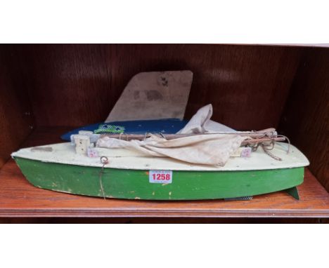 Two vintage pond yachts, largest 44cm long. 