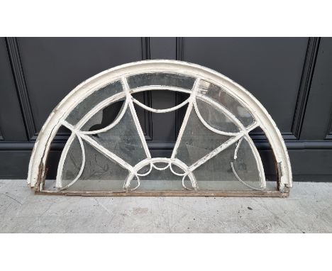 An antique white painted fan light, 50 x 97cm. 