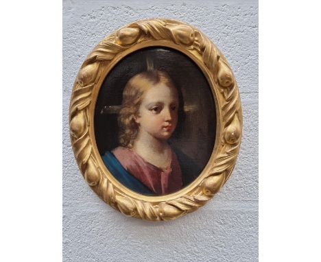 European School, 19th century, head and shoulders portrait of a young man, oil on canvas, 29.5 x 24.5cm oval, in a carved gil