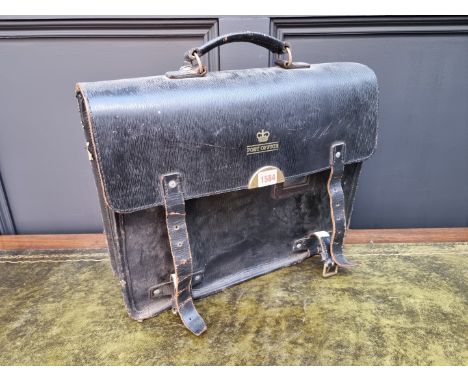 A vintage black leather Post Office satchel. 