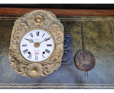 An antique French brass comtoise clock,&nbsp;the 8 1/4in enamel dial inscribed 'Nehou a Cherbourg', with embossed surround, 4