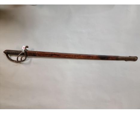 An 1822 Pattern Artillery Officer's sword, (possibly Edwardian), by Wilkinson, in associated leather scabbard.