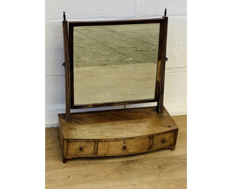 Mahogany bow fronted toilet mirror with three frieze drawers, 52 x 21 x 59cms. Estimate £15-30