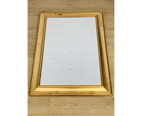 Rectangular gilt wood mirror with bevel edge glass, 104 x 71cms; together with an oval giltwood mirror with bevel edge glass.