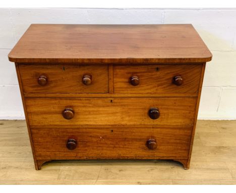 Victorian mahogany chest of two over two drawers with bun handles on bracket feet, 96 x 53 x 73cms. Estimate £40-60.