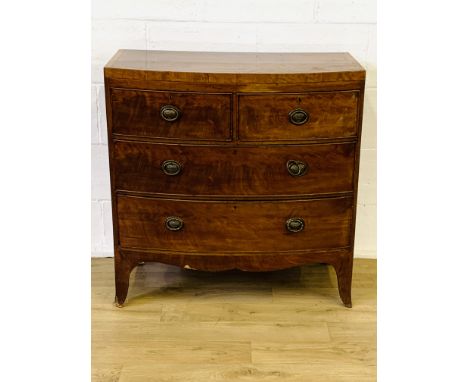 Mahogany veneer bow fronted chest of two over two drawers on bracket feet, 97 x 49 x 97cms. Estimate £40-60.