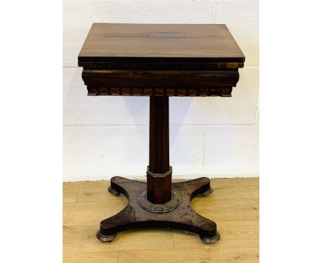 Rosewood lift top games table revealing chess and cribbage board to one side and baize playing surface to other, swivels to r