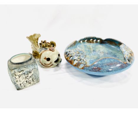 A studio pottery bowl, diameter 27cm; a studio pottery fish (as found); a Troika vase (as found), 9cm. Estimate: £15-30