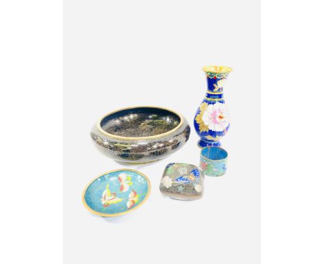 A cloisonne bowl, 20cm diameter; a cloisonne vase, 15cm; cloisonne napkin ring; cloisonne lidded dish decorated with butterfl