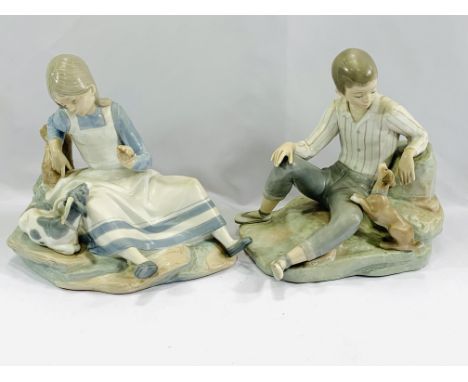 A Nao figure of a girl playing with a goat, 24cms; a Lladro figure of a boy playing with a dog, 24cms; together with A Nao fi