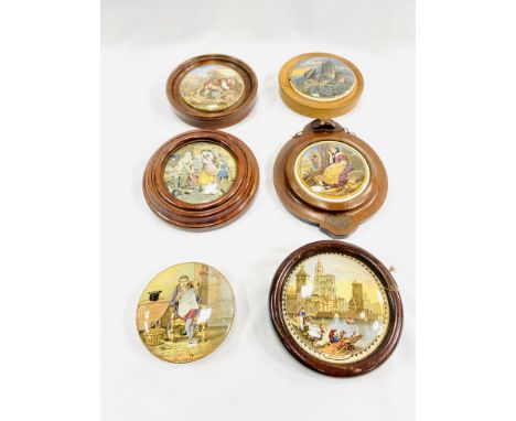 A collection of five wood framed ceramic pot lids, together with an unframed ceramic pot lid. Estimate: £30-50
