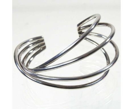 A Georg Jensen silver Alliance bangle, 8cm wide, 48g grossOverall condition is complete and undamaged. Very light signs of us