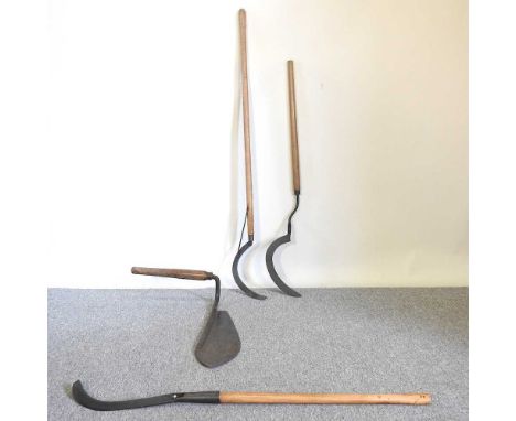 A collection of vintage iron hand scythes, with wooden handles (4)