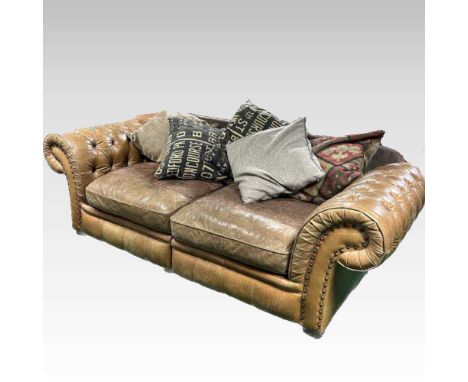 A brown leather chesterfield sofa, with loose cushions231w x 105d x 80h cm