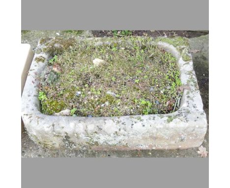 A cast stone garden trough, planted, 63cm wide63w x 48d x 14h cmWeathered and dirty. Full of plants and soil so difficult to 