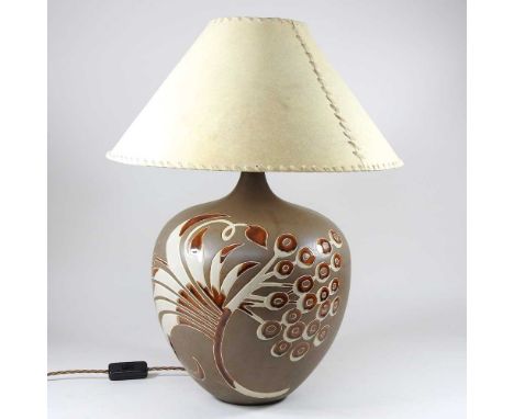 A brown glazed pottery table lamp, with shade, 58cm high overall