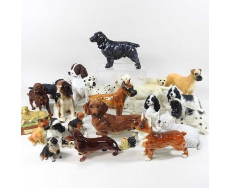 A collection of pottery dogs, to include Goebel, Beswick and Leonardo, highest 18cm