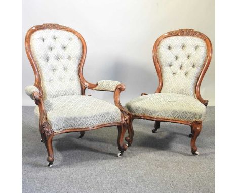 A pair of Victorian button back show frame armchairs, on cabriole legs (2)