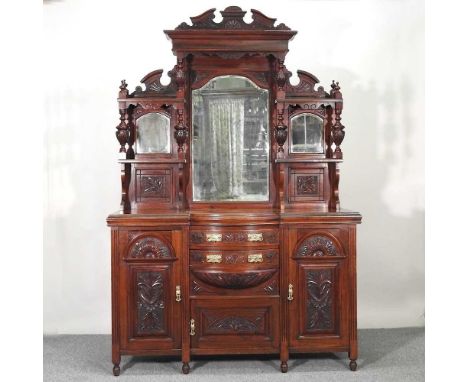 A Victorian mirror back sideboard, with a shaped back, containing drawers and cupboards below152w x 64d x 224h cm.
