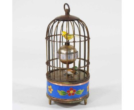 A reproduction automaton bird cage clock, 17cm high